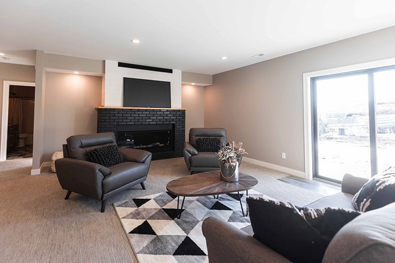 The Experience Builders - basement living area