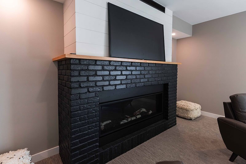 The Experience Builders - basement fireplace